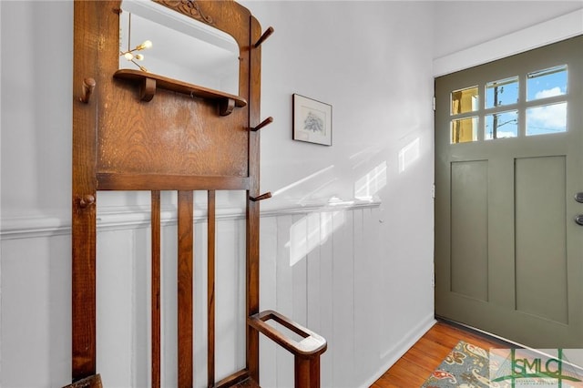 foyer entrance with light hardwood / wood-style floors