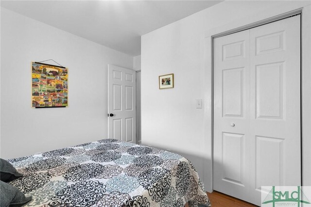 bedroom featuring hardwood / wood-style floors