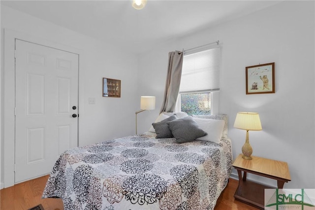 bedroom featuring hardwood / wood-style floors