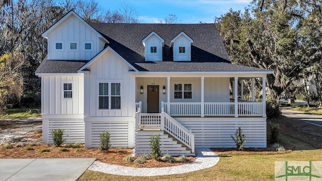1895 Downing Ave, Savannah, GA 31404 - view of front of property featuring board and batten siding, a porch, a shingled roof, and stairs