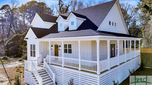 1895 Downing Ave, Savannah, GA 31404 - modern farmhouse with covered porch, roof with shingles, board and batten siding, and stairs