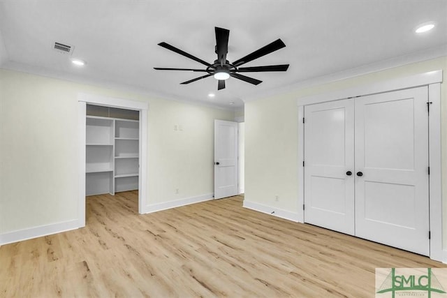 unfurnished bedroom featuring crown molding, ceiling fan, and light hardwood / wood-style flooring