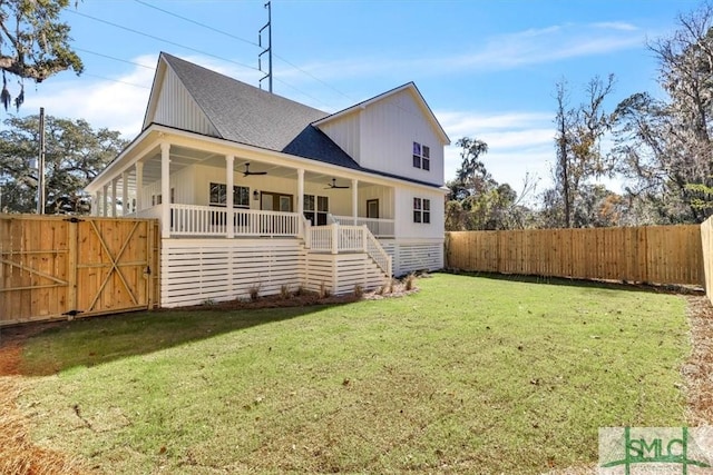 view of front of property with a porch and a front yard