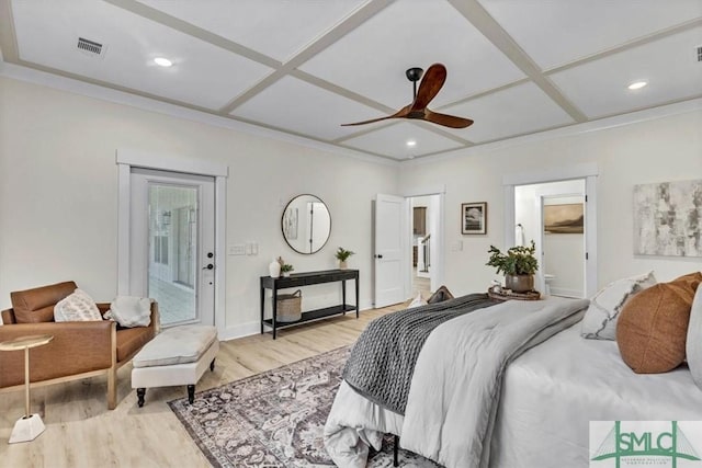 bedroom featuring coffered ceiling, connected bathroom, crown molding, ceiling fan, and light hardwood / wood-style flooring