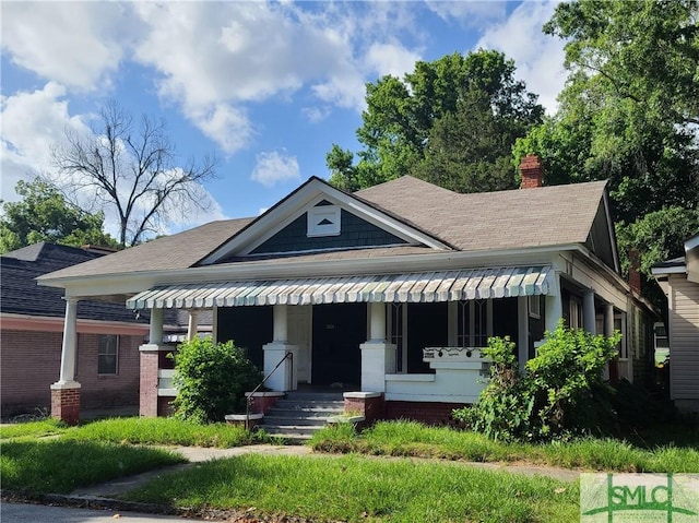 view of front of house featuring covered porch