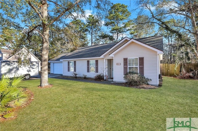 single story home featuring a front lawn and a garage