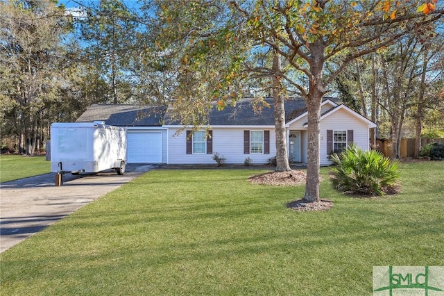 ranch-style home featuring a front yard and a garage