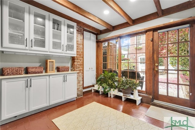 entryway with beam ceiling