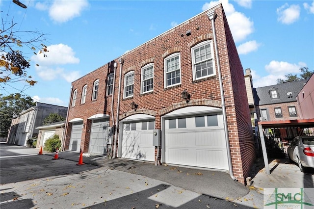 view of property featuring a garage