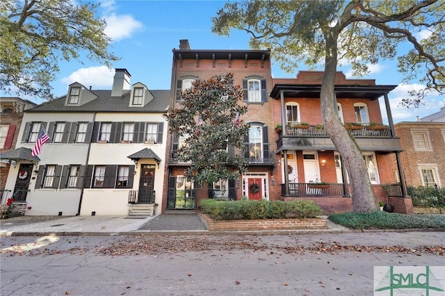 view of property with a balcony