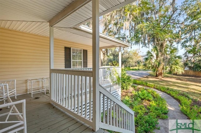 wooden deck featuring covered porch