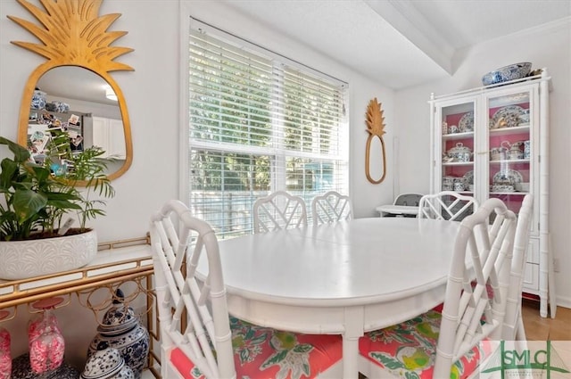 dining room featuring ornamental molding