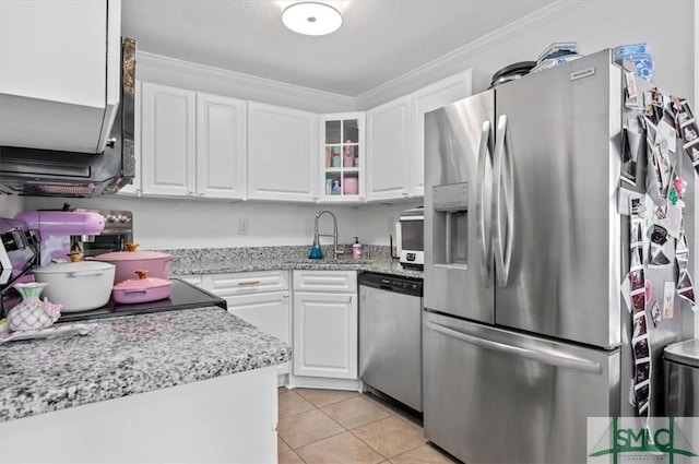 kitchen with white cabinetry, sink, stainless steel appliances, crown molding, and light tile patterned floors