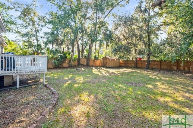 view of yard with a deck