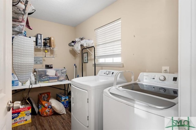 laundry room featuring independent washer and dryer and wood-type flooring