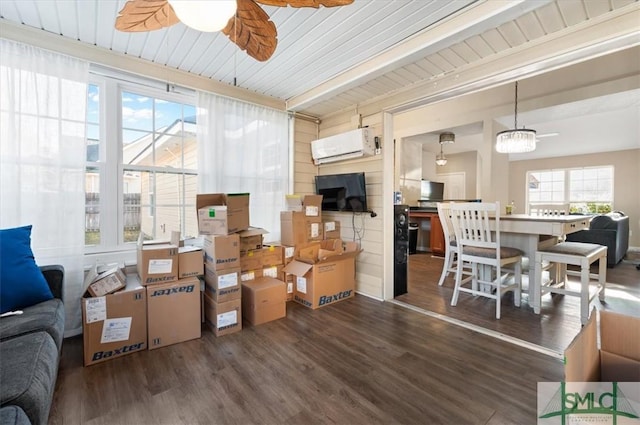 interior space featuring dark hardwood / wood-style floors and a wall mounted AC