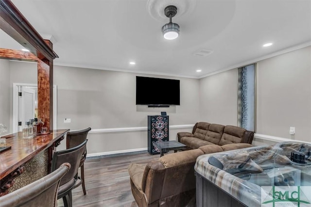 living room featuring ornamental molding and hardwood / wood-style flooring