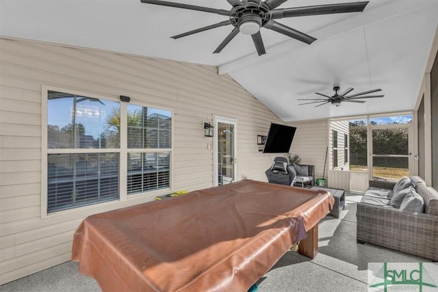 rec room featuring ceiling fan, wood walls, and lofted ceiling with beams