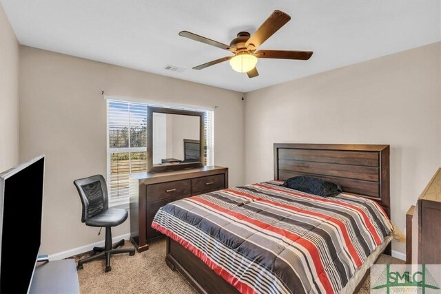 carpeted bedroom with ceiling fan