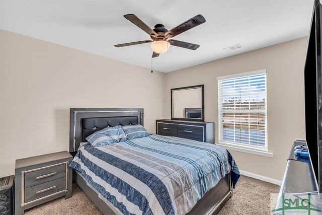 carpeted bedroom featuring ceiling fan