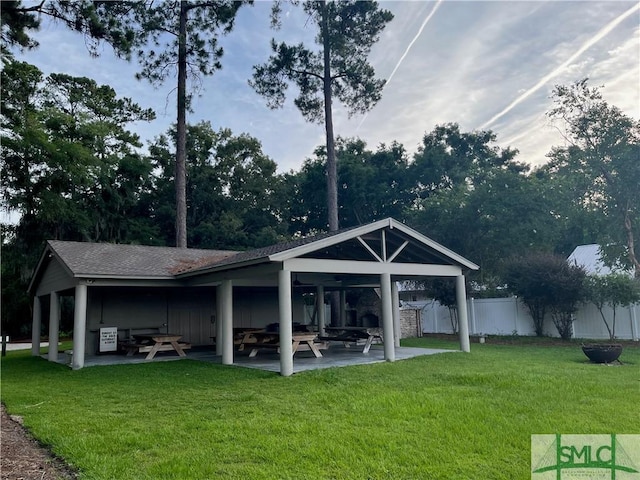 view of outdoor structure with fence