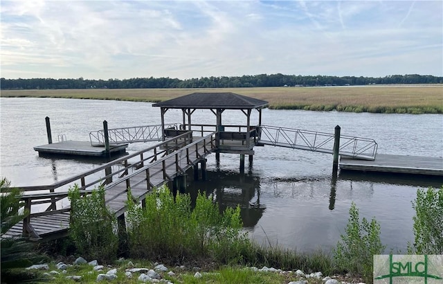 view of dock with a water view