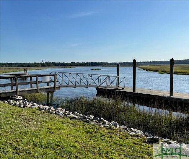 view of dock with a water view