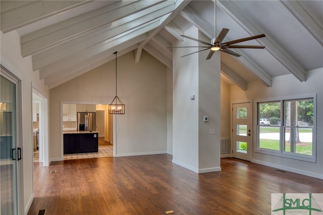 unfurnished living room featuring dark wood-style floors, visible vents, and beamed ceiling