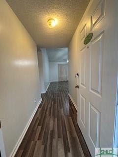 hall with dark hardwood / wood-style flooring