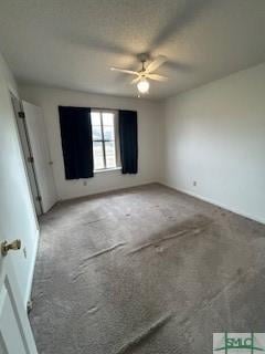 unfurnished room featuring carpet flooring and ceiling fan