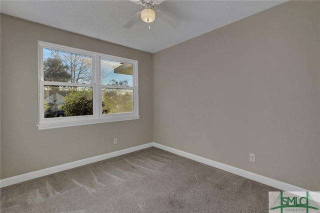 empty room featuring ceiling fan and carpet floors