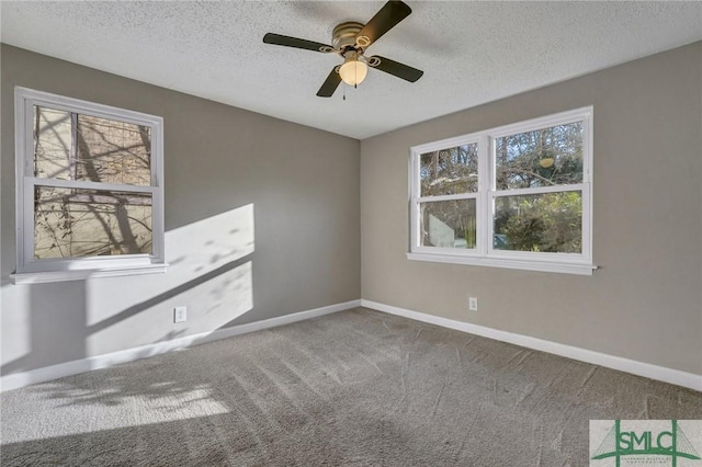 2052 E 42nd St, Savannah, GA 31404 - spare room with carpet flooring, a textured ceiling, and a ceiling fan