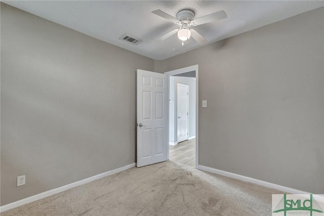 2052 E 42nd St, Savannah, GA 31404 - carpeted spare room with a ceiling fan and a textured ceiling