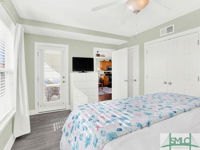 bedroom with hardwood / wood-style flooring and ceiling fan