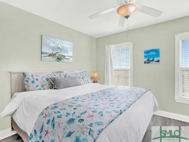 bedroom featuring ceiling fan and wood-type flooring