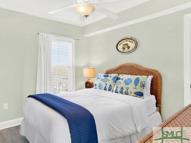 bedroom featuring ceiling fan and hardwood / wood-style floors