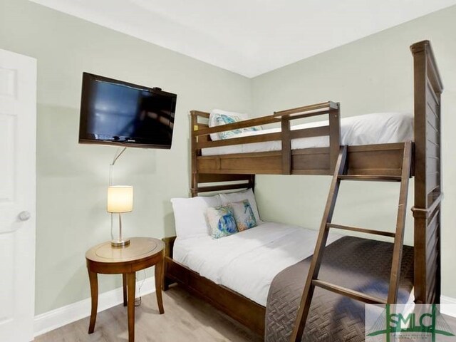 bedroom featuring light wood-type flooring