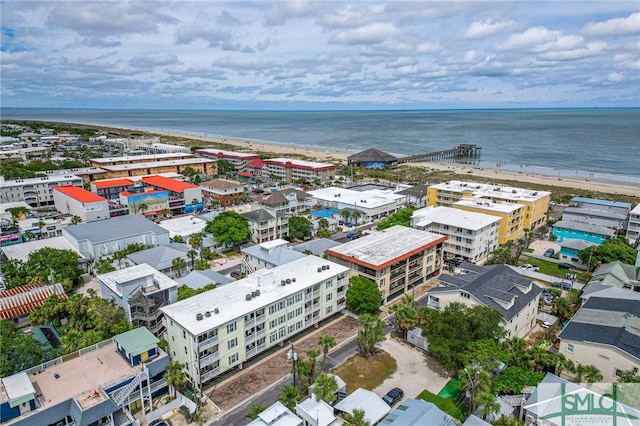 aerial view with a water view and a view of the beach