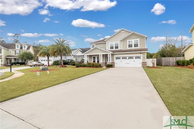 view of front of home featuring a garage and a front lawn