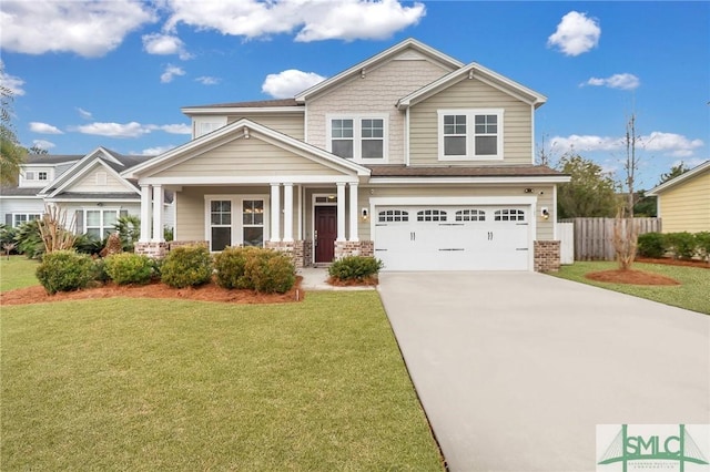 craftsman-style house featuring a garage and a front yard