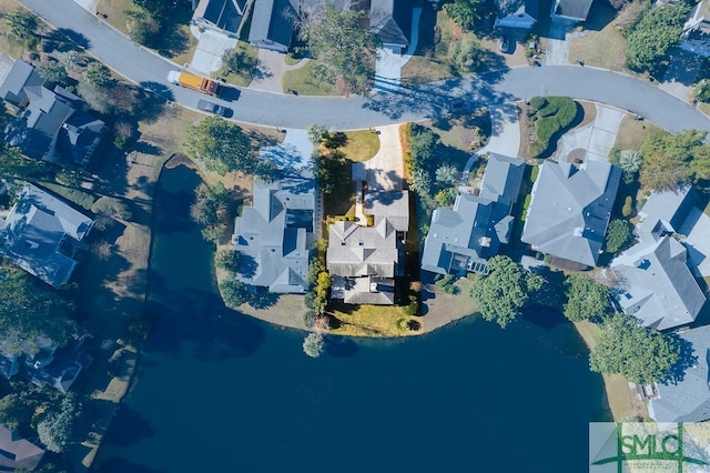 birds eye view of property with a residential view