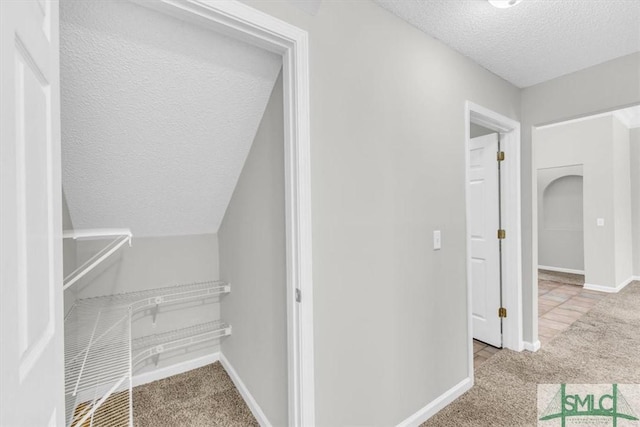 52 Sedgefield Ct, Richmond Hill, GA 31324 - hallway with a textured ceiling and carpet floors