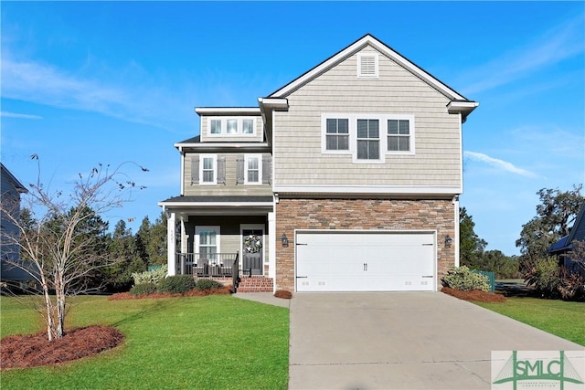 view of front of home with a porch, a garage, and a front lawn