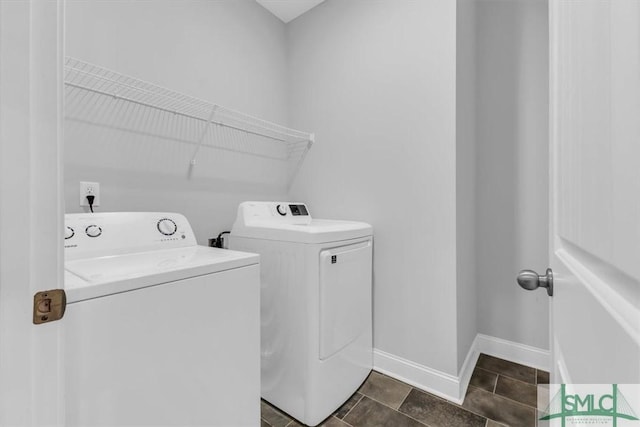 washroom with independent washer and dryer