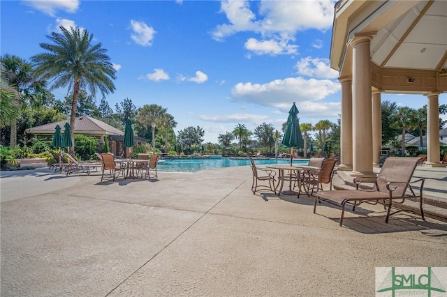 view of swimming pool featuring a gazebo and a patio area