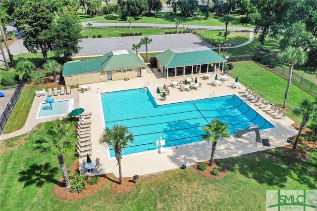 view of swimming pool with a patio area