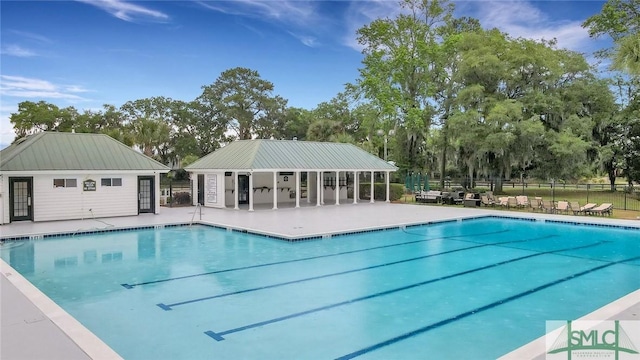 view of pool featuring a patio