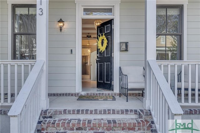 property entrance featuring a porch