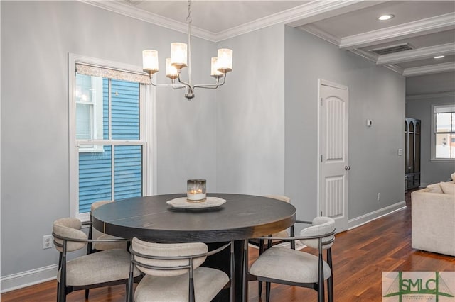 dining area featuring beam ceiling, dark wood-type flooring, a chandelier, and ornamental molding