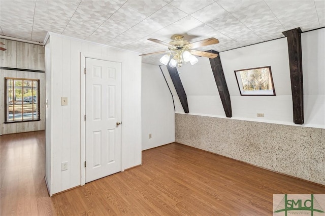 bonus room featuring hardwood / wood-style flooring and ceiling fan